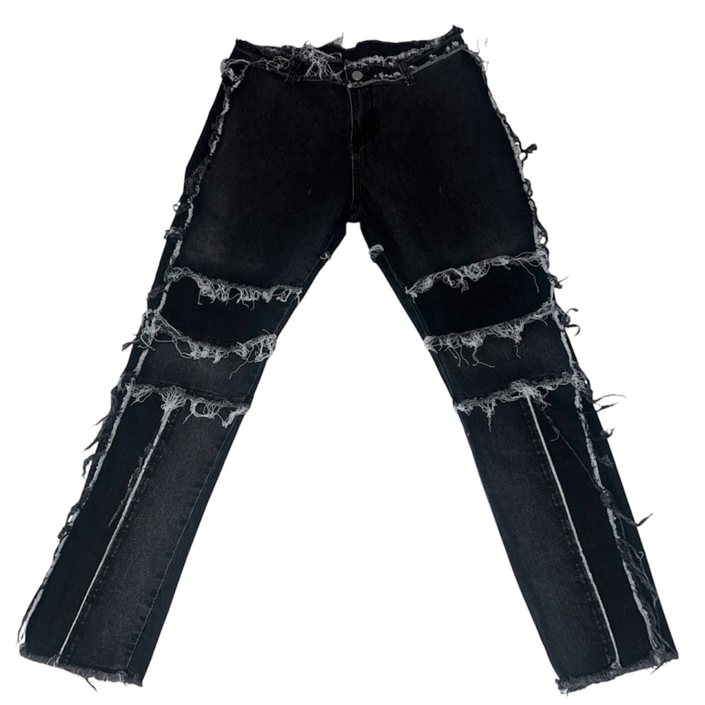 Black Deconstructed denim jeans.